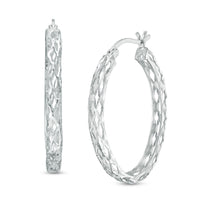 18mm Diamond-Cut Oval Hoop Earrings in Sterling Silver