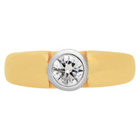 Diamond ring bezel set heavy mounted In 18k yellow gold ring.
