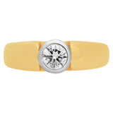 Diamond ring bezel set heavy mounted In 18k yellow gold ring.